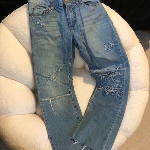 LEVI’S Straight leg 505 distressed jeans.